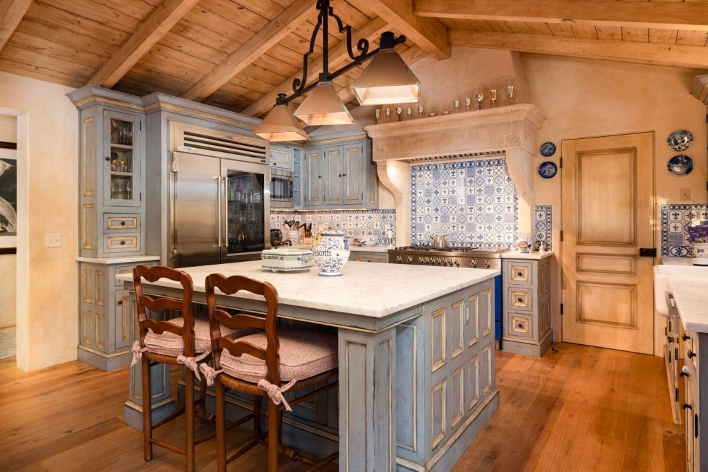 Turnkey kitchen at 965 Brooktree Road with a large island and beamed ceiling